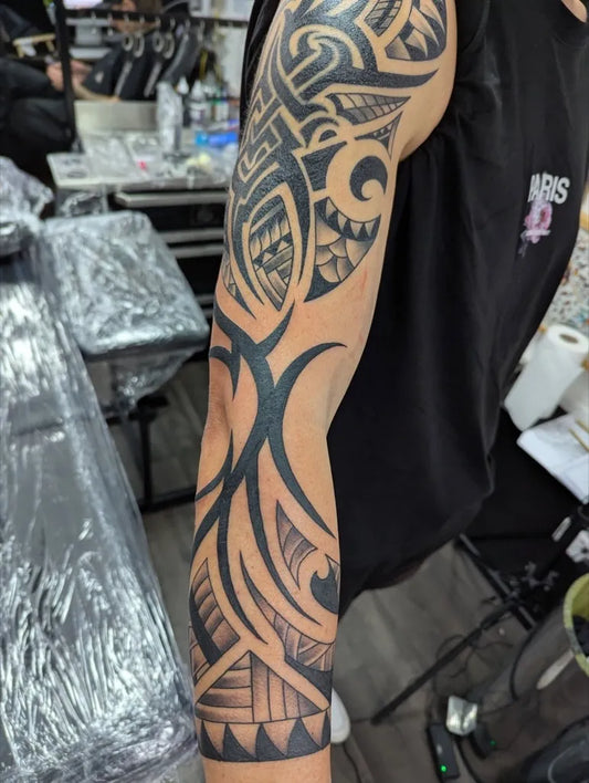 Big Tribal Tribal Patterns Maori Motifs on Men Arm Tattoo by @darren_redbeard_tattoos