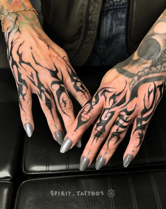 Big Tribal Vines on Women Hands Tattoo by @spirit.tattoos