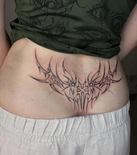 Big Tribal Wings and Script on Women Back Tattoo by @jjjanon