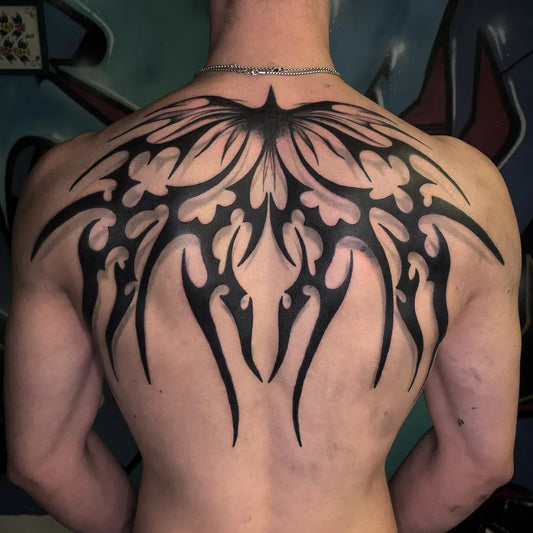Big Tribal Wings on Men Back Tattoo by @tuke_opastattoo