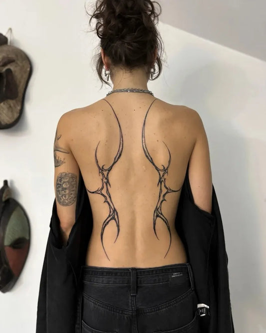 Big Tribal Wings on Women Back Tattoo by @_sebastian_ttt