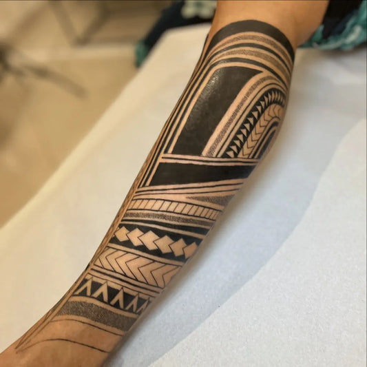 Big Tribal geometric patterns bold lines tribal motifs on Men Arm Tattoo by @mariduquetattoo
