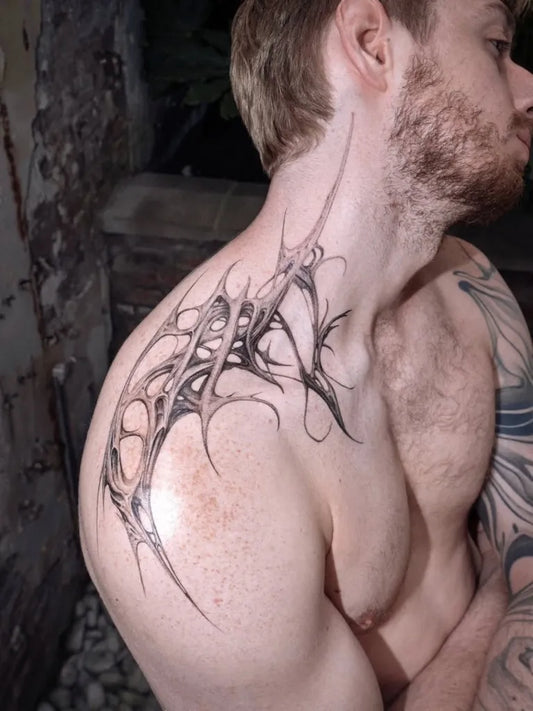 Big Tribal spiky thorny vines on Men shoulder Tattoo by @ferus_amsterdam