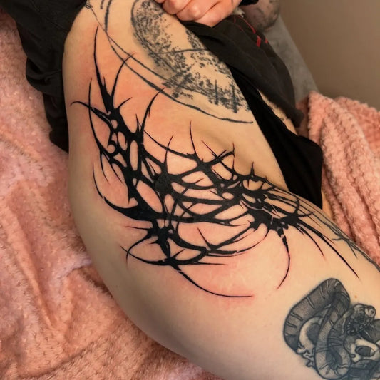 Big Tribal thorned branches moon snake on Women Thigh Tattoo by @leviathanslilbae