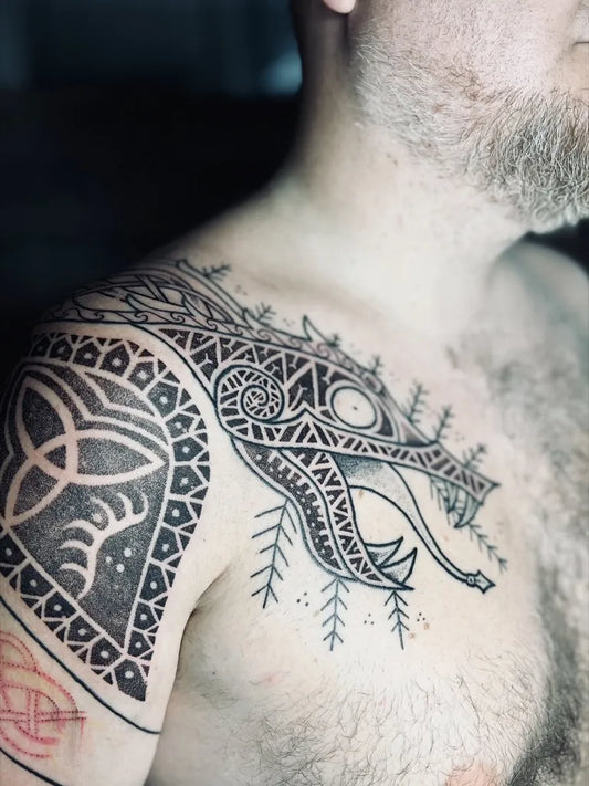 Big Viking Dragon and Triquetra on Men Shoulder Tattoo by @baba_jaga_atelier
