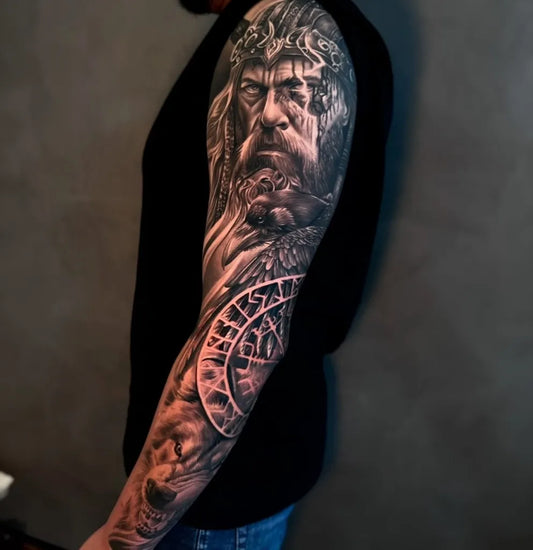 Big Viking Odin and Vegvisir on Men Arm Tattoo by @ale.spinolatattoo
