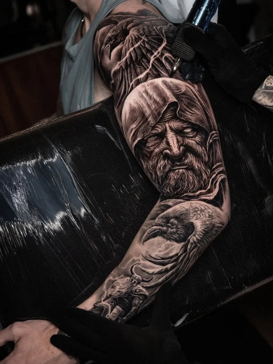 Big Viking Odin with Ravens on Men Arm Tattoo by @pabloart_tattooer