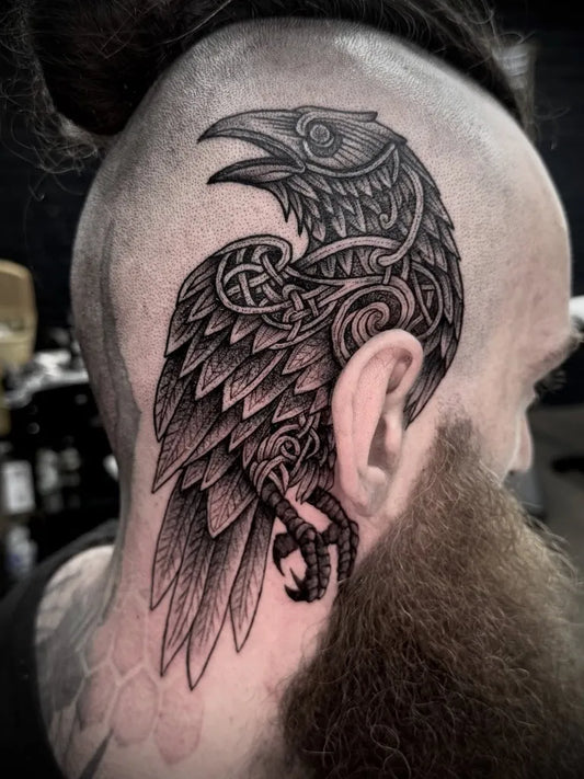 Big Viking Raven on Men Head Tattoo by @angryface.tattoo