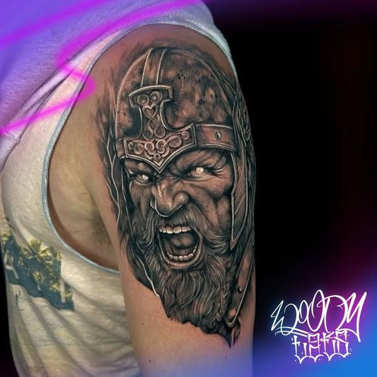Big Viking Roaring Warrior on Men Arm Tattoo by @woody.tats
