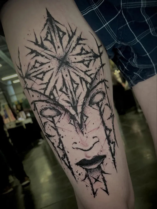 Big Viking spiked star mask on Men thigh Tattoo by @void.vitriol