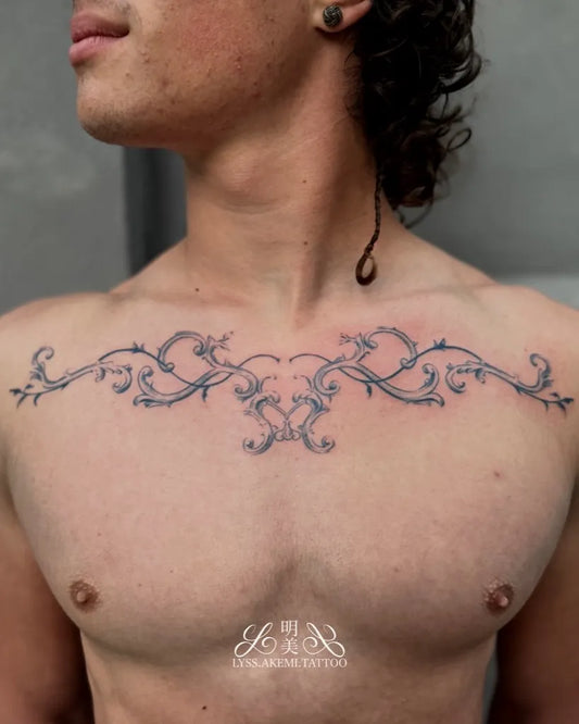 Big Vine and Floral Motif on Men Chest Tattoo by @lyss.akemi.tattoo