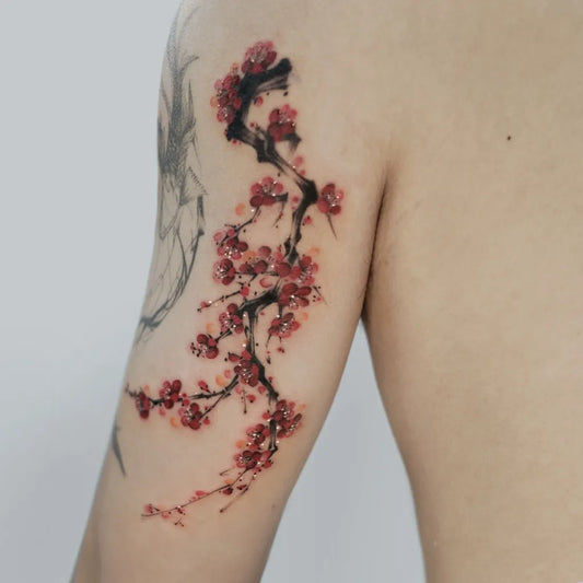 Big Watercolor Cherry Blossom Branches on Men Arm Tattoo by @cici.geeink.jpg