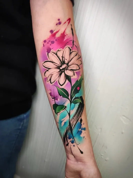 Big Watercolor Daisy Flower on Women Arm Tattoo by @pablo.colors.tattoos