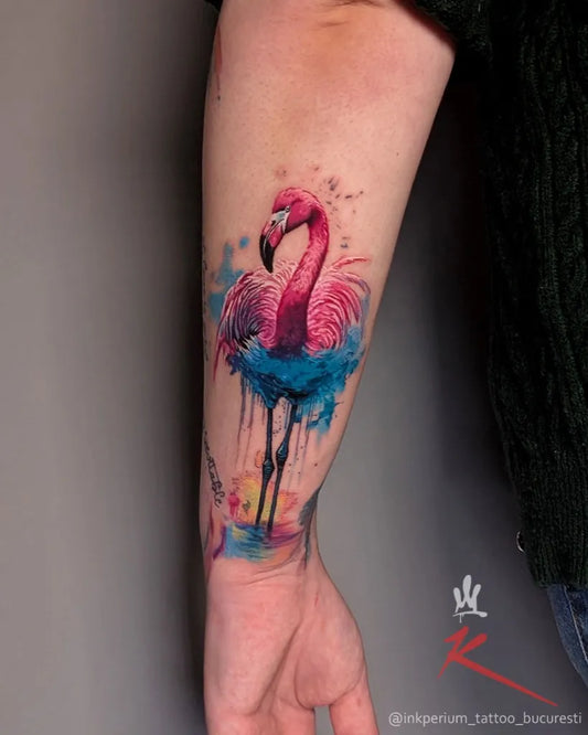 Big Watercolor Flamingo Tattoo on Women Arm by @inkperium_tattoo_bucuresti