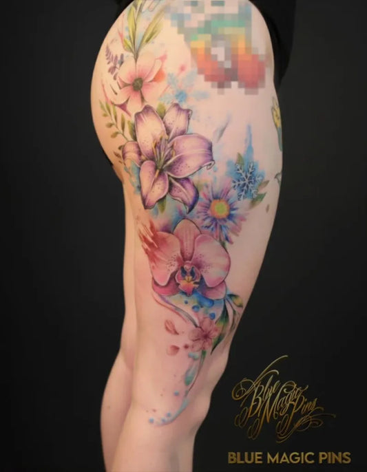 Big Watercolor Flowers on Women Thigh Tattoo by @blue_magic_pins