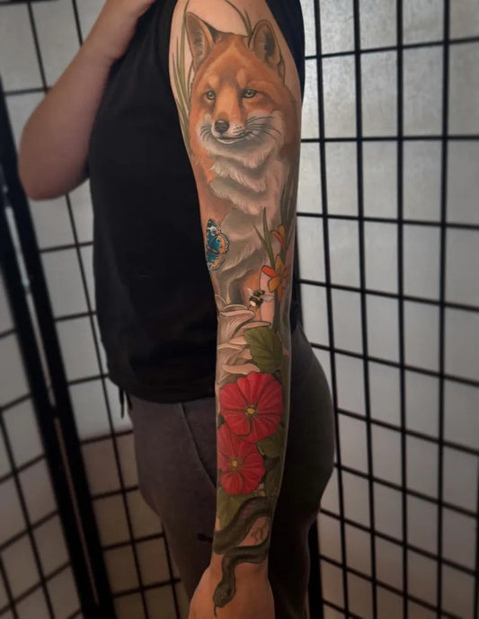 Big Watercolor Fox and Flowers Tattoo on Women Arm by @missautumndancer