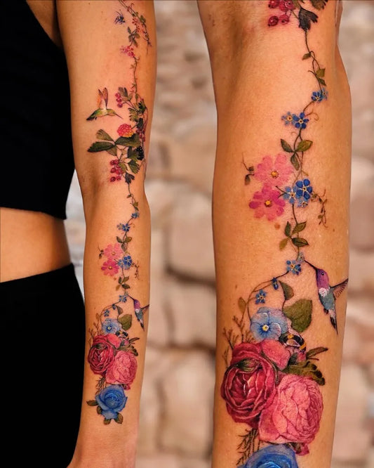 Big Watercolor Hummingbird Flowers on Women Arm Sleeve Tattoo by @song.e.tattoo