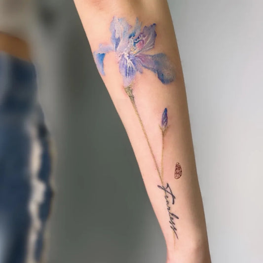 Big Watercolor Iris Flower and Ladybug on Women Arm Flower Tattoo by @iknow_tattoo