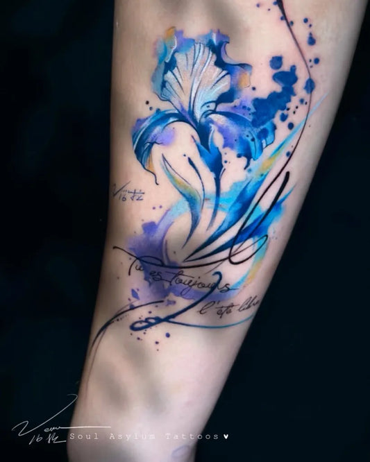 Big Watercolor Iris Flower and Script on Women Arm Tattoo by @soul_asylum237