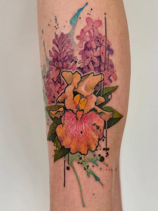 Big Watercolor Orchid and Lilacs on Women Thigh Tattoo by @mrcoffeybean