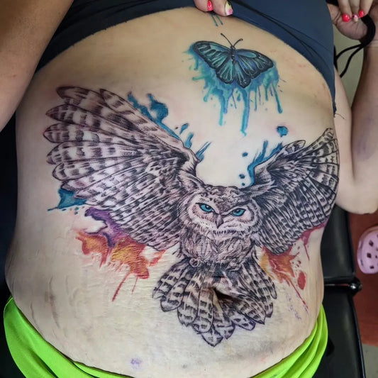 Big Watercolor Owl and Butterfly Tattoo on Women Stomach by @_lydiathetattoolady