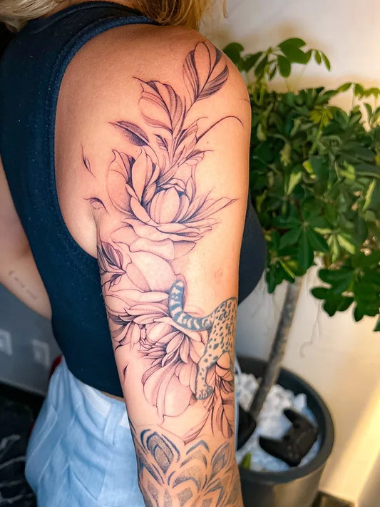 Big Watercolor Peony Flower and Leaves on Women Arm Flower Tattoo by @ca_fioresink