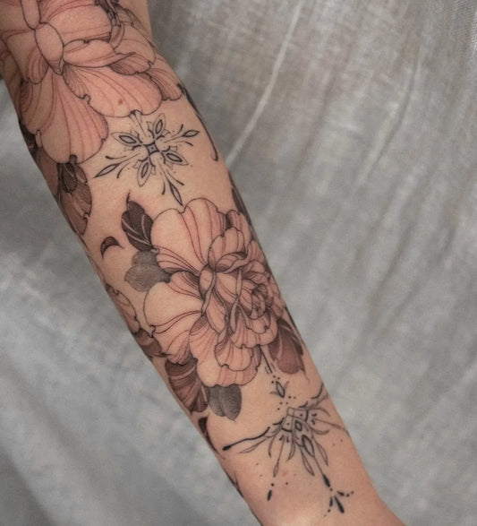 Big Watercolor Peony and Snowflakes on Women Forearm Tattoo by @tattoosbyjus