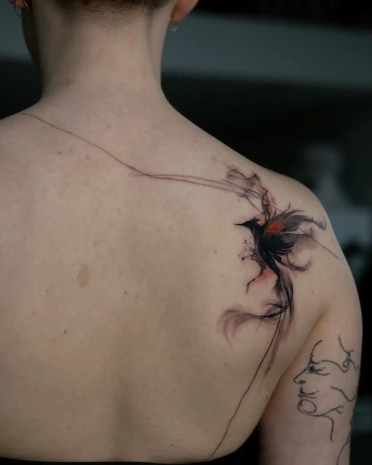 Big Watercolor Phoenix and Abstract Lines on Women Back Tattoo by @vocozun