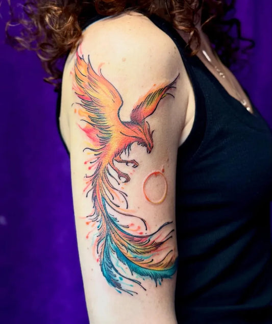 Big Watercolor Phoenix and Ring on Women Arm Tattoo by @sugartattooart