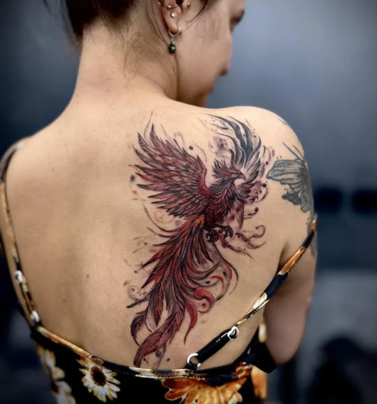 Big Watercolor Phoenix and Wings on Women Back Tattoo by @vilma_tattoo