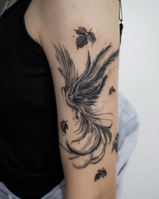 Big Watercolor Phoenix with Maple Leaves on Women Arm Tattoo by @maru.tattooist