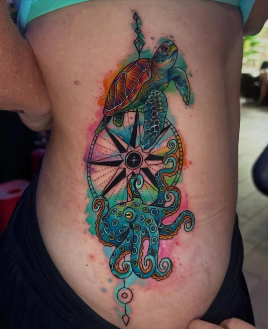 Big Watercolor Sea Turtle Compass Octopus Tattoo on Women Side by @inkaholicisla