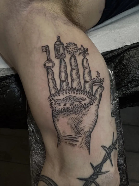 Big Woodcut Hand with Occult Symbols Tattoo on Men Arm by @amberida.tattoo