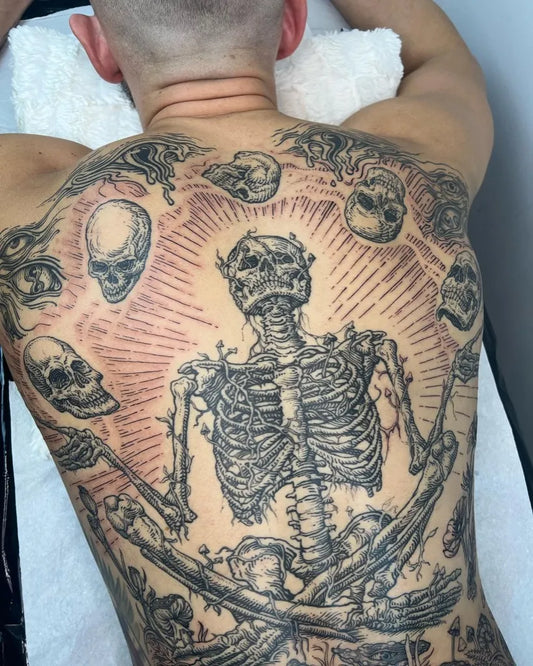 Big Woodcut Skeleton with Skulls Tattoo on Men Back by @mara_artworks