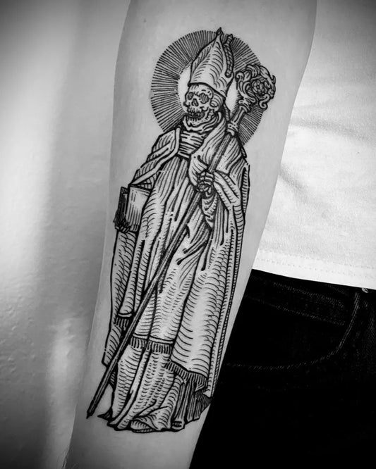 Big Woodcut SkeletonBishopwithStaffandBook Tattoo on Men Arm by @markofcaintattoo