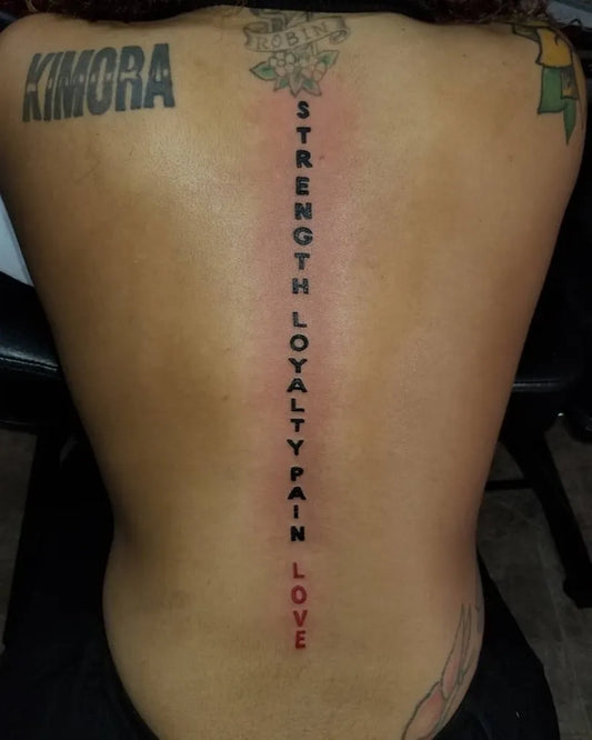 Big Word Spine on Women Tattoo by @dredlockrock