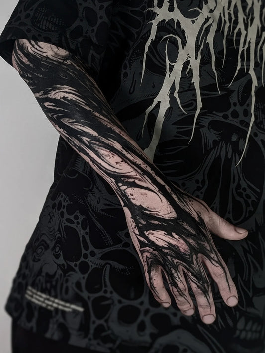 Blackwork Pattern Tattoo on Men Arm by @ellenheald_tattoo.webp