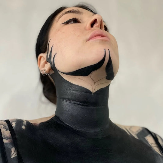 Blackwork Throat Tattoo on Women by @neckandthroat_tattoos