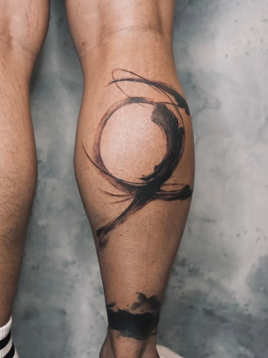 Medium Abstract Abstract Circle and Splash Tattoo on Men Leg by @hopuiness.tattoo