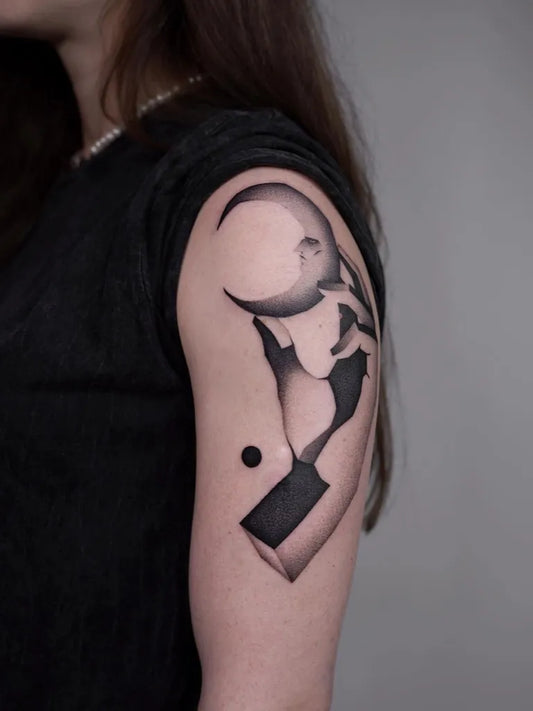 Medium Abstract Blackwork Moon Skull Cube Tattoo on Women Shoulder by @maxi_tattooer