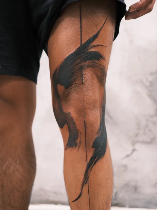 Medium Abstract FeatheredWing Tattoo on Men Thigh by @s.tattoostudio