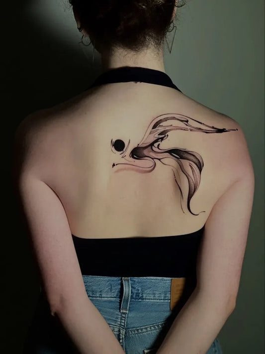 Medium Abstract Flowing Wings Tattoo on Women Back by @mattylism