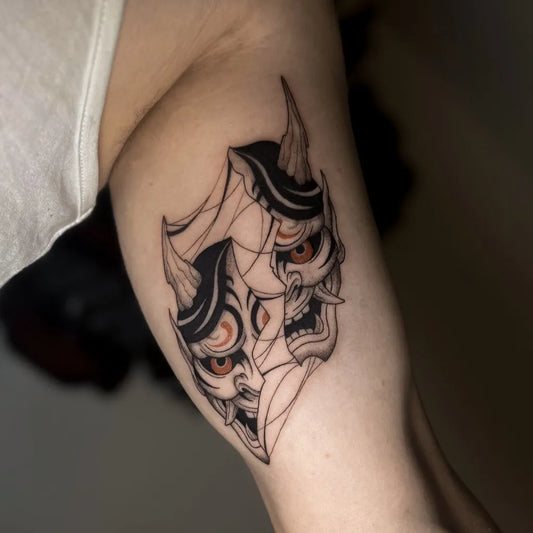 Medium Abstract Oni Masks on Men Arm Tattoo by @tatidotattoo