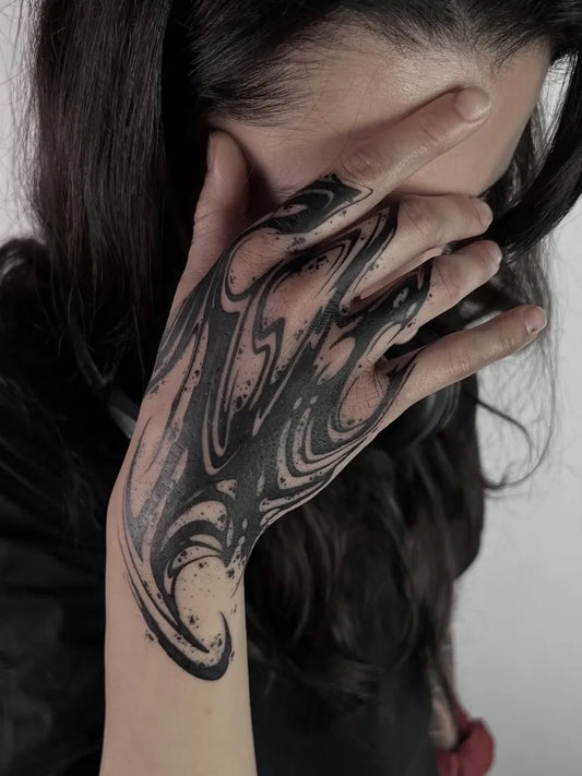Medium Abstract Swirling Black Ink Tattoo on Women Hand by @abradark