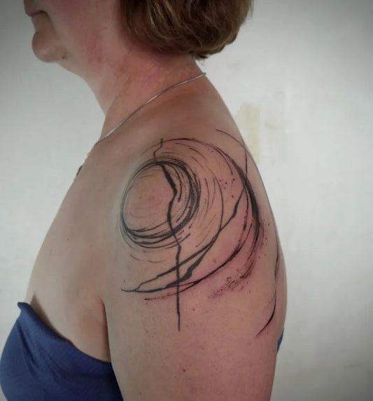 Medium Abstract Swirling Circles Tattoo on Women Shoulder by @sionaxttt