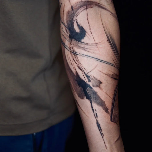 Medium Abstract Watercolor Swirls Tattoo on Men Arm by @hopuiness.tattoo