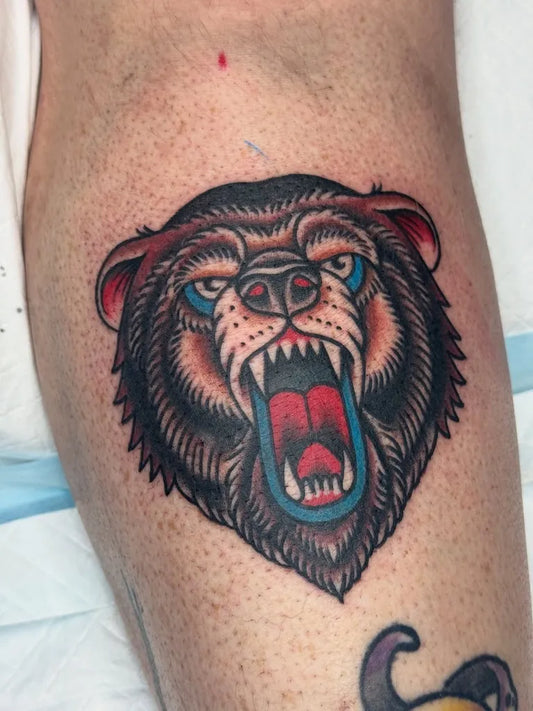 Medium American Traditional Bear Head on Men Arm Tattoo by @jrb.tattoo.art