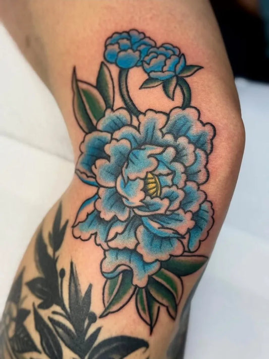 Medium American Traditional Blue Peony and Leaves on Women Knee Tattoo by @surelynottattoo