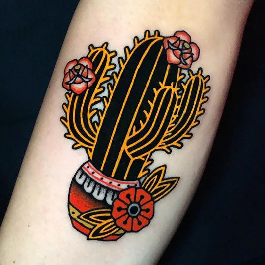 Medium American Traditional Cactus Flower Pot Tattoo on Women Arm by @tattoosarethecoloroflife