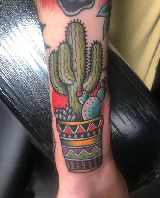 Medium American Traditional Cactus and Pot Tattoo on Women Arm by @joshhaigler